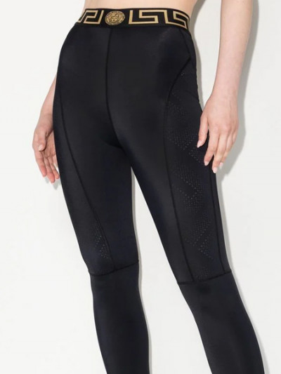 Shop Versace athletic leggings at half price from Farfetch